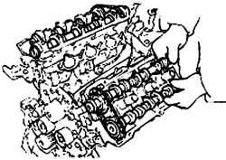 Снятие распределительных валов с головки блока цилиндров